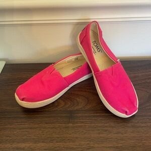 Tom's pink canvas slip ons